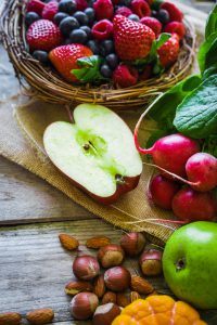 Fruits and vegetables on rustic background